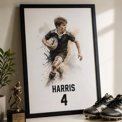 Framed personalised rugby print on a shelf beside a trophy and boots